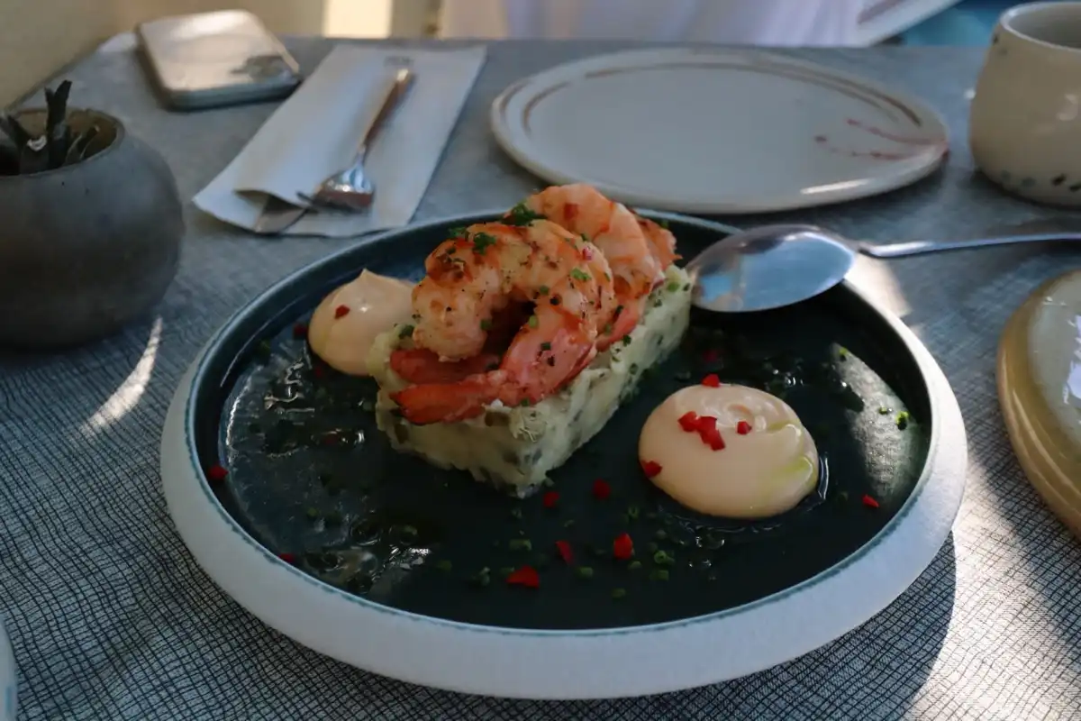 Warm aromatic potato salad with shrimp